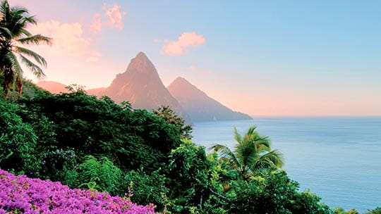 A view towards the Pitons at sunset, St Lucia